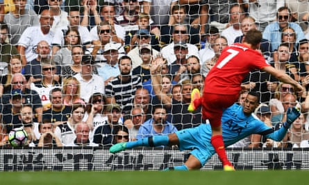 James Milner sends Michel Vorm the wrong way to open the scoring from the penalty spot.