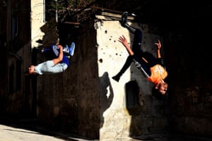 Syrian youths practise parkour in Aleppo, northern Syria