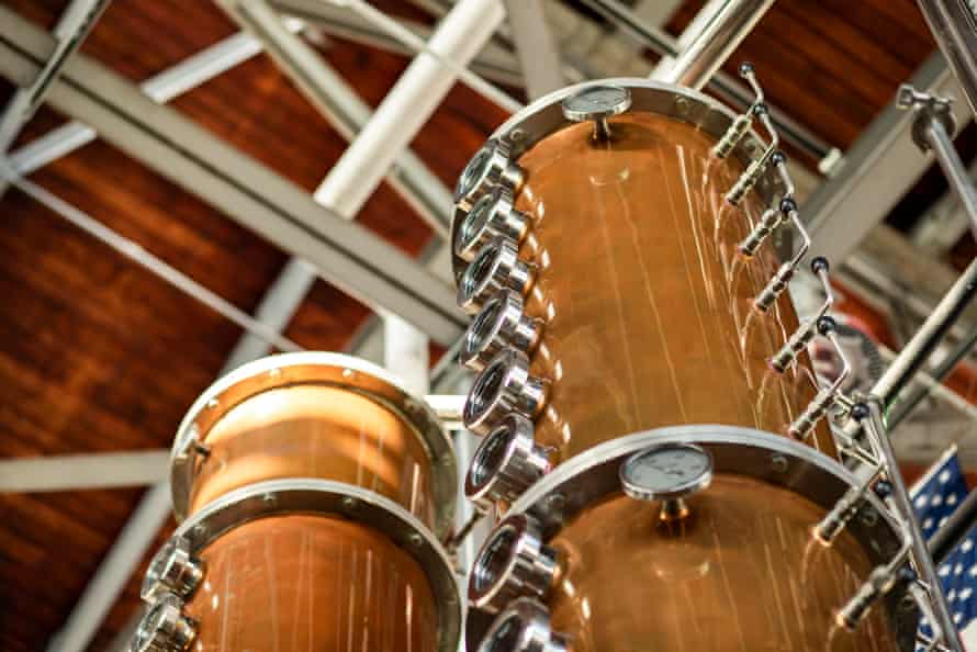 How a California distillery is turning fire-damaged grapes into ‘something awesome’ | California 2 Copper distillery equipment stretches toward the ceiling at Hangar 1.