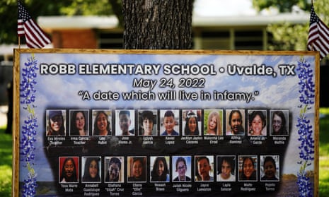 Pictures of victims are placed at the former Robb elementary school in Uvalde, Texas, on the first anniversary of the school shooting that killed 19 pupils and two teachers.