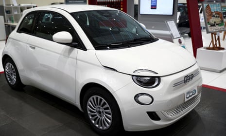 A Fiat 500 electric car is displayed at a showroom of a car dealer in Rome, Italy.