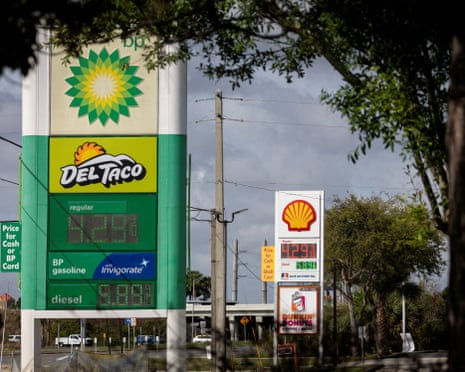 price displays at a row of gas stations