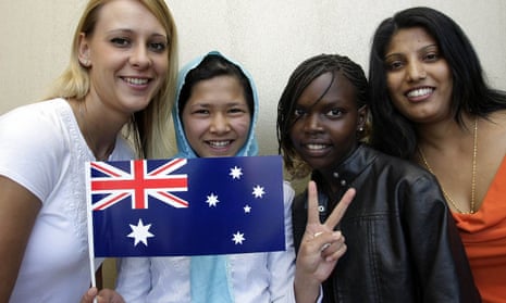 (Left to right) Monica Junczyk from Poland, Khalida Qalanoar from Afghanistan, Nyagoa Steven from Sudan and Radhika Devi from the Fiji Islands at an Australia Day citizenship ceremony in Victoria.