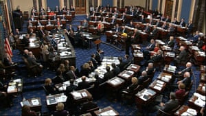 The hundred senators took their seats at individual desks arranged in a semicircle facing John Roberts.