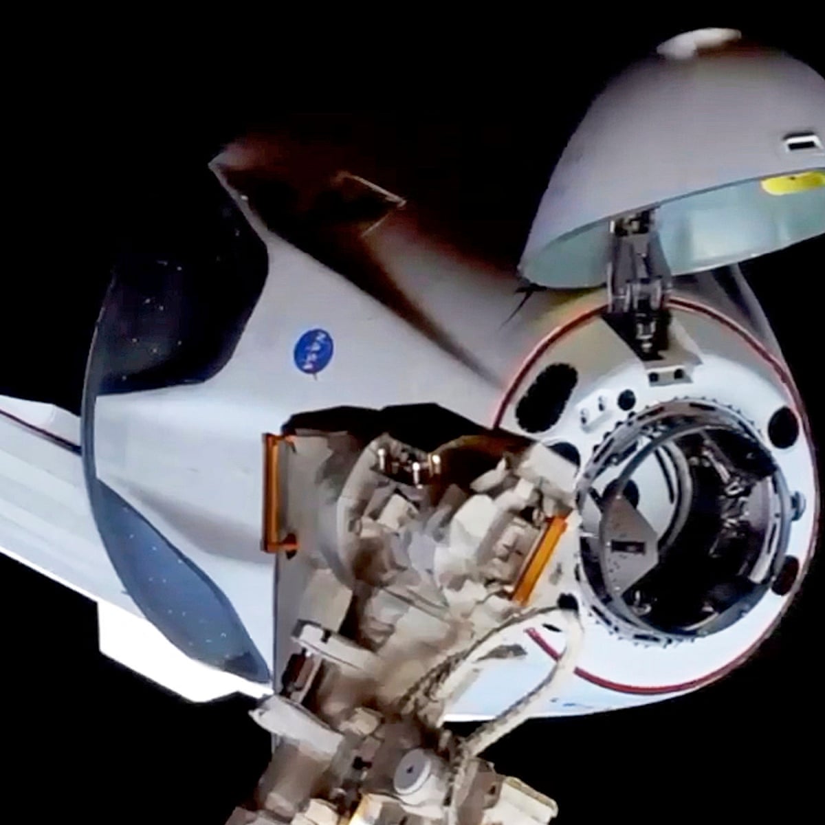 Spacex Dragon Crew Capsule Docks At International Space Station
