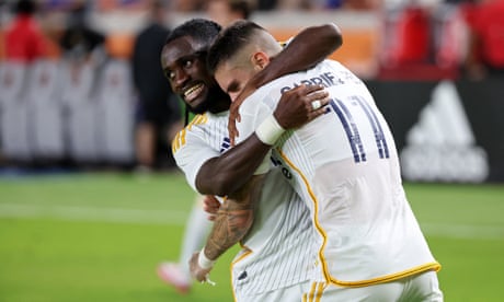 LA Galaxy forward Gabriel Pec (11) celebrates with forward Joseph Paintsil (28) after scoring a goal on a penalty against Houston Dynamo FC during the second half at Shell Energy Stadium.