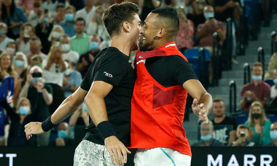 Nick Kyrgios (right) and Thanasi Kokkinakis celebrate after winning match point in their men's doubles final match.