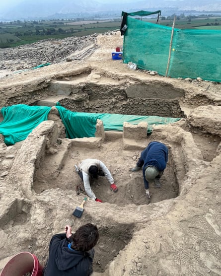 people digging at an archaeological site