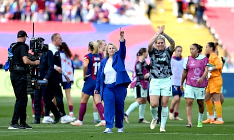 Emma Hayes, Manager of Chelsea, acknowledges the fans alongside Millie Bright of Chelsea after the team's victory in the Women's Champions League 2023/24 semi-final first leg against Barcelona.