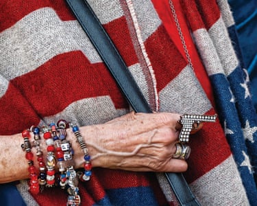 Gun Ring, New York, 2024 ‘This image,’ says Samoylova, ‘was taken at Brooklyn Memorial Day Parade, an event steeped in civic history. What first caught my eye was this woman’s hand resting against a flag-patterned shawl, piled with beaded bracelets and a rhinestone pistol ring. The gesture felt small, yet it opened up a larger conversation about patriotism, personal style and the presence of gun culture in everyday life.’