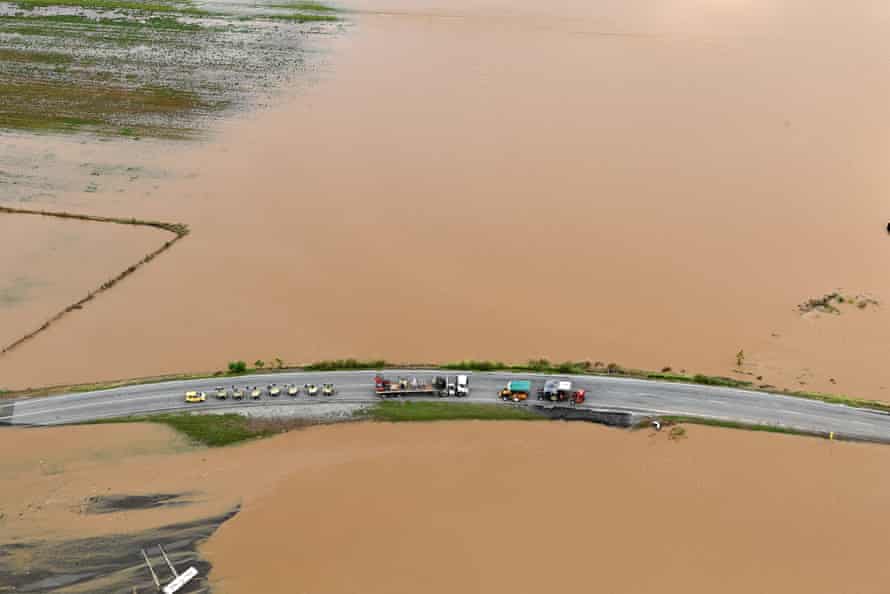 Roads leading to the town of Gympie are cut off by floodwaters.