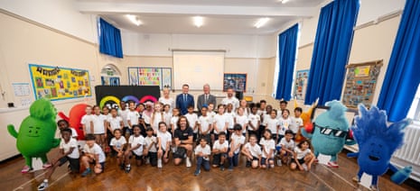 Wes Streeting (centre back) and Joe Wicks (centre middle) with pupils and Activate characters.