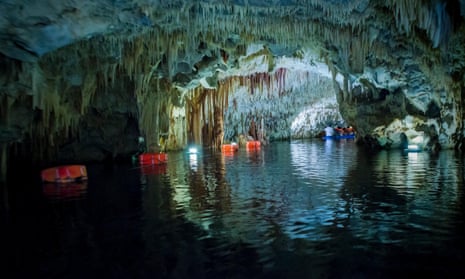 Stalagmites and stalactites in the caves of Diros in Greece.