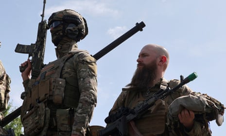 Members of the 'Russian Volunteer Corps' and 'Freedom of Russia Legion'. According to the group of Russian fighters, who are aligned with Ukraine, they engaged in cross-border raids in Russia’s Belgorod region.