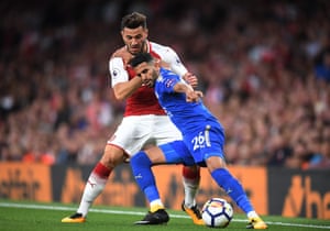 Leicester’s Riyad Mahrez holds off Arsenal’s Sead Kolasinac as The Gunners beat The Foxes 4-3 at the Emirates.