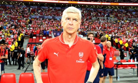 Arsène Wenger looks on after beating Everton in a pre-season friendly in Singapore last week.