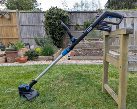 Andy Shaw testing the mac allister cordless grass trimmer