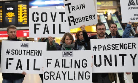 Commuters protest at Victoria station in December before marching to call for Grayling’s resignation