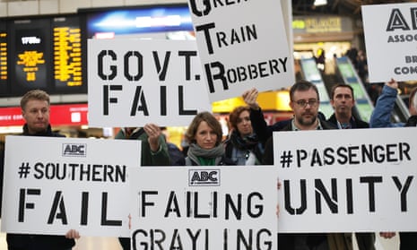 Commuters stage a protest at Victoria Station, London, amid the continued disruption on Southern Railway.