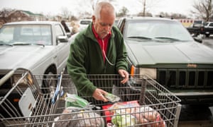 A man in North Carolina uses a food bank to supplement his $16 monthly food stamps.