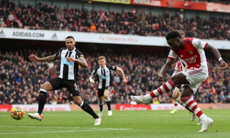 Bukayo Saka of Arsenal scores their team’s first goal.