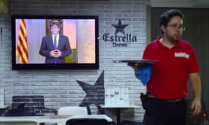 Catalan president Carles Puigdemont makes an address on television.