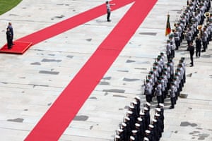 Ukraine’s president, Volodymyr Zelenskyy, and the German chancellor, Friedrich Merz, inspect a guard of honour at the Chancellery in Berlin