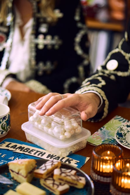 Ashleigh-Rose with her hand on a box of pearls on the table