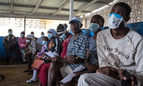 Patients wait to be tested for tuberculosis at a hospital in Liberia.