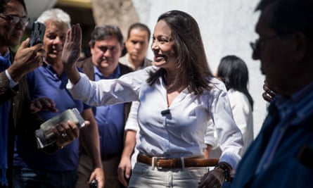 Venezuelan opposition leader Maria Corina Machado greets her followers during a rally in Caracas in January