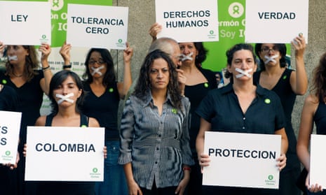 The Colombian journalist and victim Jineth Bedoya, center, and several others take part in a silent rally in 2009.