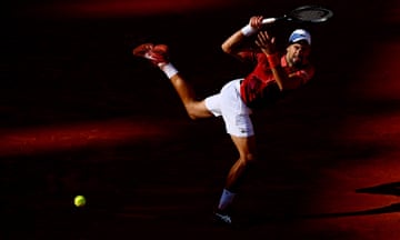 Novak Djokovic of Serbia plays a backhand.