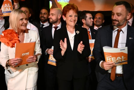 One Nation leader Pauline Hanson surrounded by people at a campaign launch