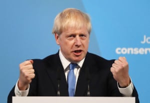 Boris Johnson clenching fists during speech