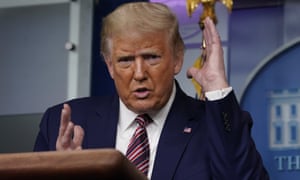 Donald Trump gestures while speaking during a news conference at the White House.