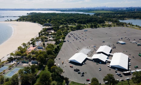 An aerial photo taken with a drone shows emergency tents being assembled to house asylum seekers bussed to New York City from Texas and Arizona by Republican governors there, without any warning to or liaison with the city. The tents were in the process of being raised last week in the parking lot of Orchard Beach, in the Bronx borough.
