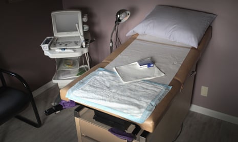 An ultrasound machine sits next to an exam table in an examination room at Whole Woman's Health of South Bend in Indiana. 