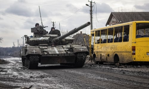 Ukrainian soldiers on a tank in Donetsk, during December.
