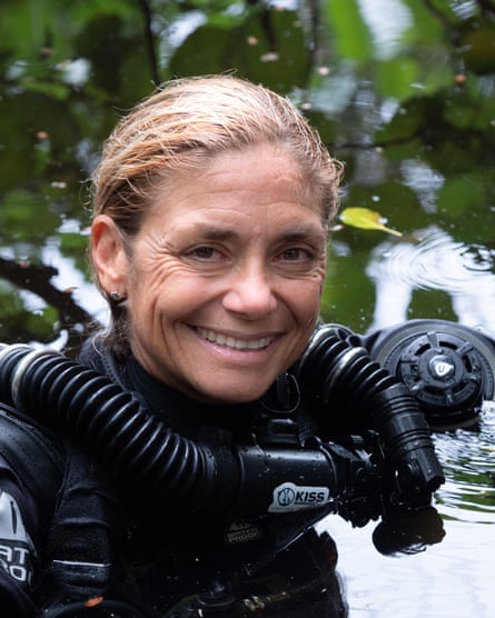 Head and shoulders portrait of Cristina Zenato wearing diving gear in the water