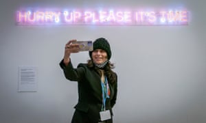 A delegate taking a selfie photograph at the conference