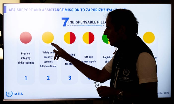 International Atomic Energy Agency (IAEA) Chief Rafael Grossi explains a graph as he speaks to the press after the return of an IAEA team from the Russian-held Zaporizhzhia nuclear power plant in southern Ukraine at Vienna International Airport in Schwechat, Austria.
