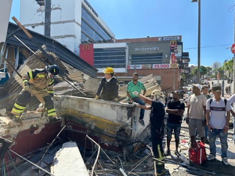People gather in the streets after a powerful earthquake struck Colombia, killing at least 18 people and causing damage in Pereira, Colombia, on August 10, 2026.