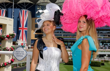 Racegoers wear spectacular hats.