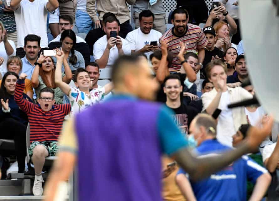 Fans cheer on Nick Kyrgios from the crowded stands on John Cain Arena