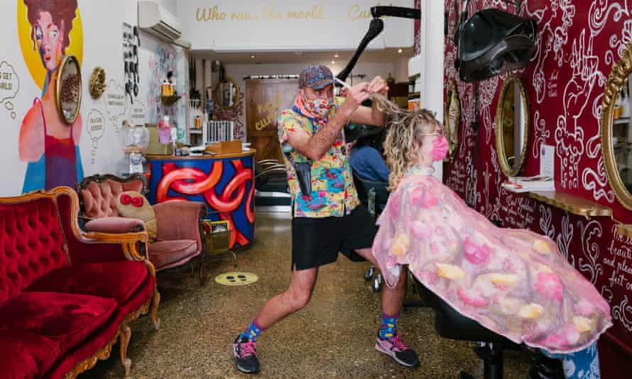 Neel Morley with a customer at his salon, Neel Loves Curls in Fitzroy