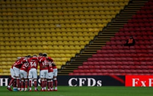 The Bristol City players huddle before their match against Watford at Vicarage Road, which ended in a 3-0 win for the Hornets