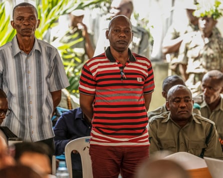 Paul Mackenzie and his co-accused standing in court.