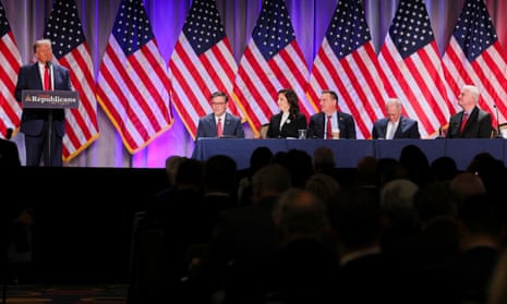 Republican House lawmakers watch as Trump speaks.