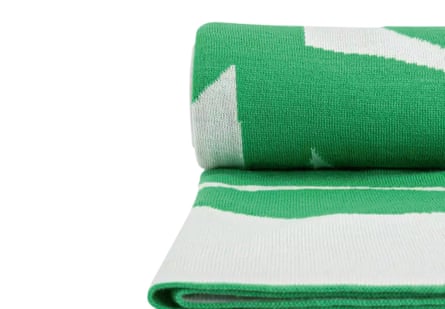 A green-and-white Habitat throw
