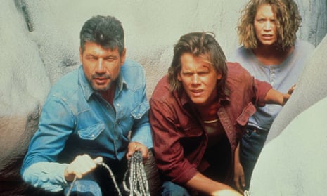 Fred Ward, left, Kevin Bacon and Finn Carter in Tremors, 1990. ‘When it came to battling underground worms, I couldn’t have asked for a better partner,’ Bacon said.